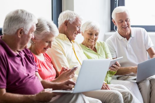 Seniors using technology in a retirement home