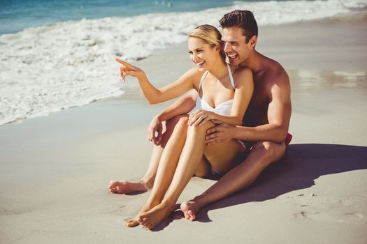 Romantic young couple having fun on beach