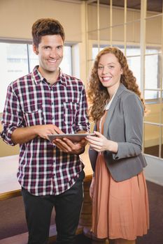 Business people posing together at work