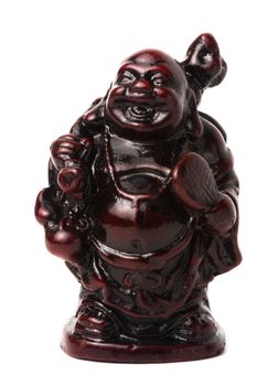 Netsuke happy fat man with a bag and a fan. Isolated. A miniature sculpture, which was used as a button-like trinket in traditional Japanese clothes kimono kosode, which was devoid of pockets.