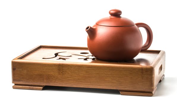 Traditional chinese tea ceremony accessories. Tea pot on the tea table