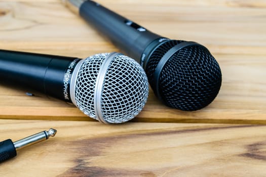 microphone on sack wooden background