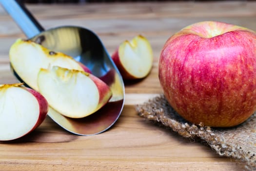 apple on sack wood background