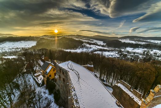 Sunset over Grodno Castle in Owl mountains, Poland