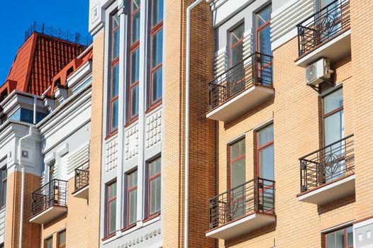 ancient architectural building with balconies in the city street