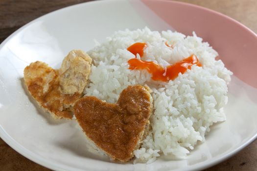 Idea for Valentine day meal cooked rice omelet in heart shape for eating simple cheap and quick food