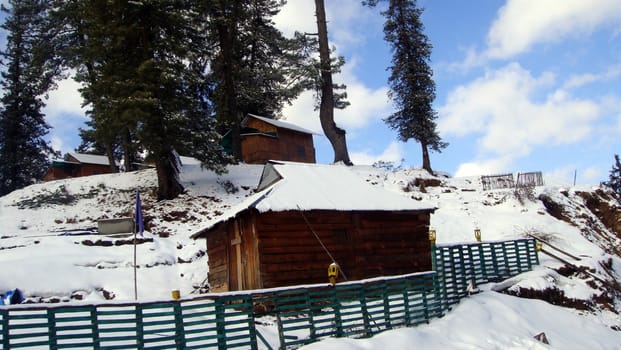 Scenic view of a snow-covered forest rest house, Narkanda, Shimla, Himachal Pradesh, India, Asia.