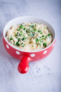 Fish pie with celery root on a wooden surface