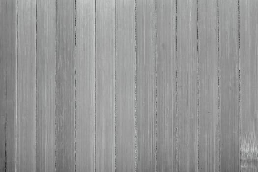 Dry reeds texture. Organic nature wallpaper of grey cane. Natural warm wooden background with bamboo and straw