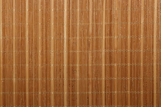 Dry reeds texture. Organic nature wallpaper of yellow cane. Natural warm wooden background with bamboo and straw