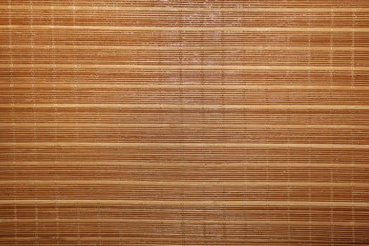 Dry reeds texture. Organic nature wallpaper of yellow cane. Natural warm wooden background with bamboo and straw