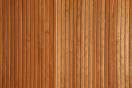 Dry reeds texture. Organic nature wallpaper of yellow cane. Natural warm wooden background with bamboo and straw