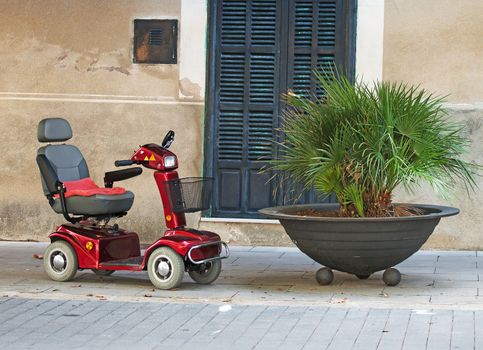 Motorized wheelchair car for disabled people.