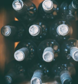 Wine bottles in the wine store. Top view.