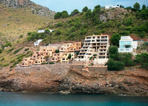 Houses in mountain hills near the sea.