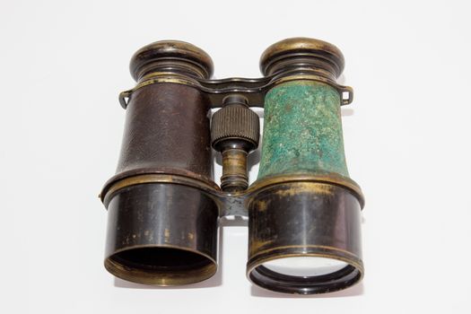 Vintage binoculars on white background