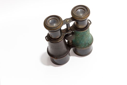 Vintage binoculars on white background