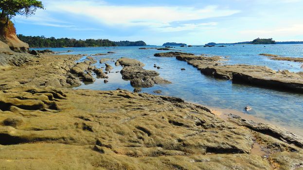 Rough rocky sea beach shore of Wandoor, Port Blair, Andaman and Nicobar Islands, India, Asia.