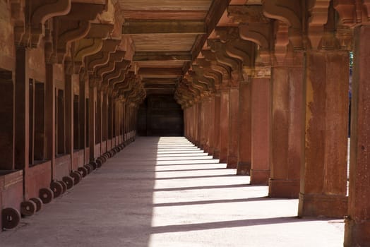 Long sandstone colonnade in Fatehpur Sikri, Agra, India.