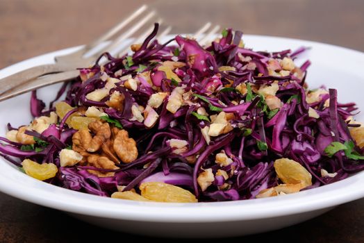salad red coleslaw with raisins and crushed walnut