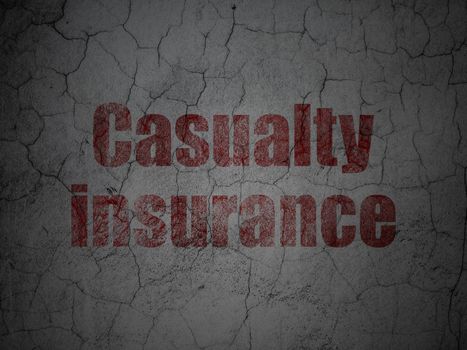 Insurance concept: Red Casualty Insurance on grunge textured concrete wall background