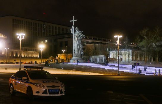 Monument to Prince Vladimir, and the traffic police in Moscow in winter