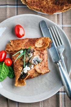 Homemade french buckwheat galette on the table 