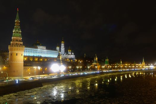 The Kremlin and the Moscow river at night in winter