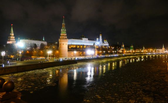 The Kremlin and the Moscow river at night in winter