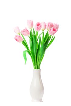 Beautiful Pink tulips flowers in vase isolated on white background. 8 march, Mother's Day concept. Small DOF.