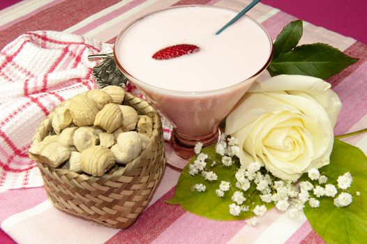 a strawberry yogurt and small sweets Ecuadorians