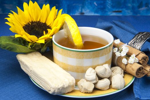 a green tea and small sweets Ecuadorians