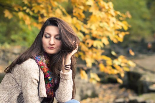 Portrait of a girl in autumn Park