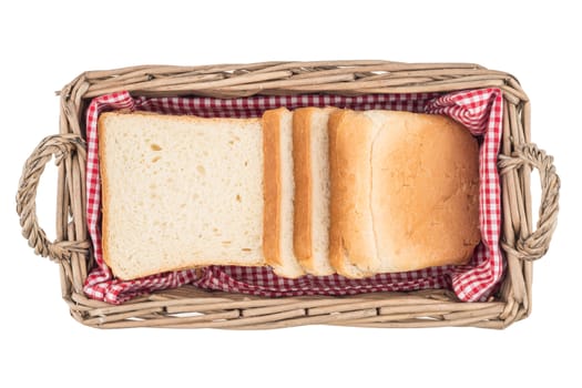 White bread in basket. Slice. Isolated on white background. Top view.