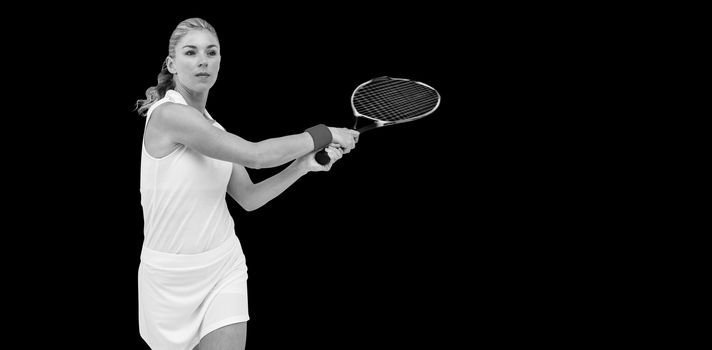 Athlete playing tennis with a racket on white background