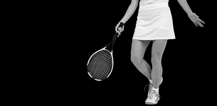 Athlete playing tennis with a racket on white background