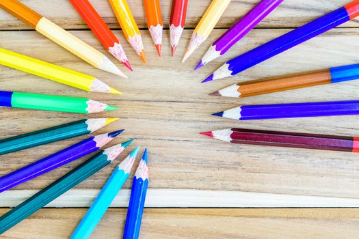 colorful pencils on the wooden table