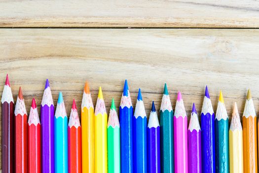 colorful pencils on the wooden table