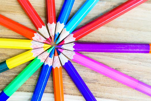 colorful pencils on the wooden table