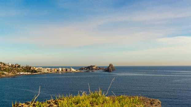 View of  sicilian rocks on blue Mediterranean sea