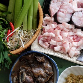 Vietnamese food, mam kho, a featured meal of Mekong Delta, Vietnam. Raw material to cook are basa fish, shrimp, bacon, citronella, garlic, chilli , eat this dish with cooked rice and vegetable