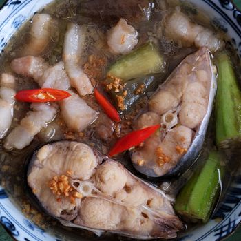 Vietnamese food, mam kho, a featured meal of Mekong Delta, Vietnam. Raw material to cook are basa fish, shrimp, bacon, citronella, garlic, chilli , eat this dish with cooked rice and vegetable