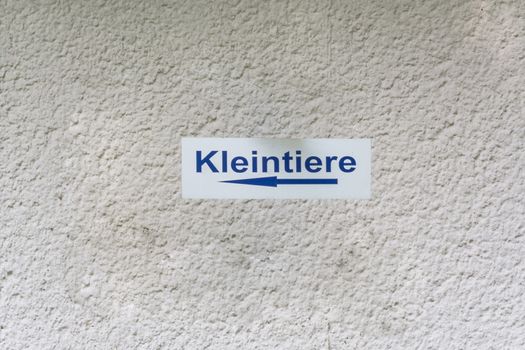 Information sign or blackboard with inscription in German Small animals.
