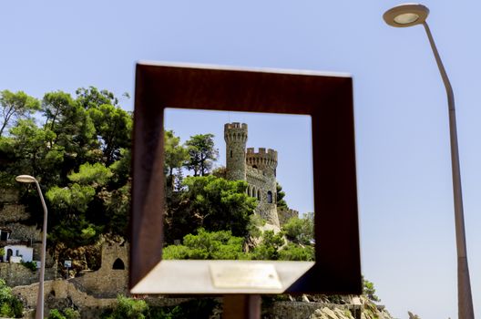 Look at Lloret de Mar castle through frame
