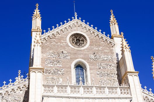 Facade of an old church on blue sky background