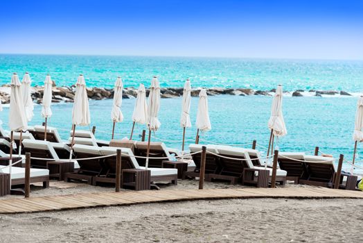 Sunbathing benches at beach