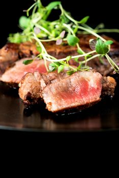 Delicious beef steak on a plate, close-up