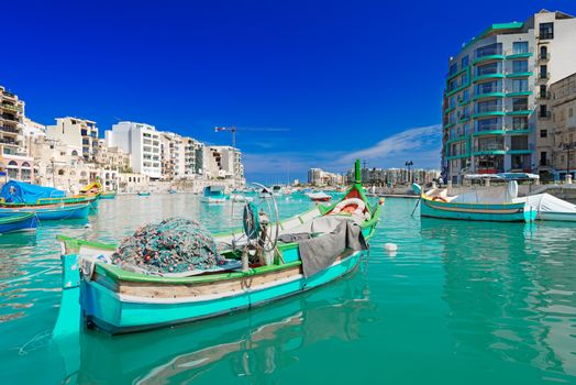 Mediterranean traditional colourful boats luzzu, Malta.