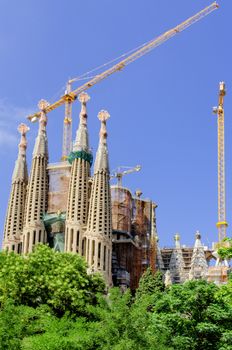 BARCELONA, SPAIN - JUNE 10, 2012: Sagrada Familia - the impressive cathedral designed by Antonio Gaudi, which is being build since 19 March 1882 and is not finished yet.