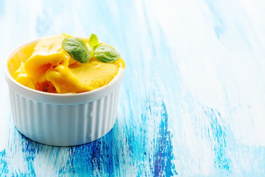 Passion fruit sherbet with mint leaves